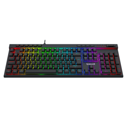 Eine mechanische Gaming-Tastatur in Standardgröße mit schwarzen Tastenkappen und lebhafter RGB-Regenbogen-Hintergrundbeleuchtung, abgebildet vor einem einfarbigen schwarzen Hintergrund. Im Bereich der Leertaste ist der Markenname „TUXEMOTION“ zu sehen.