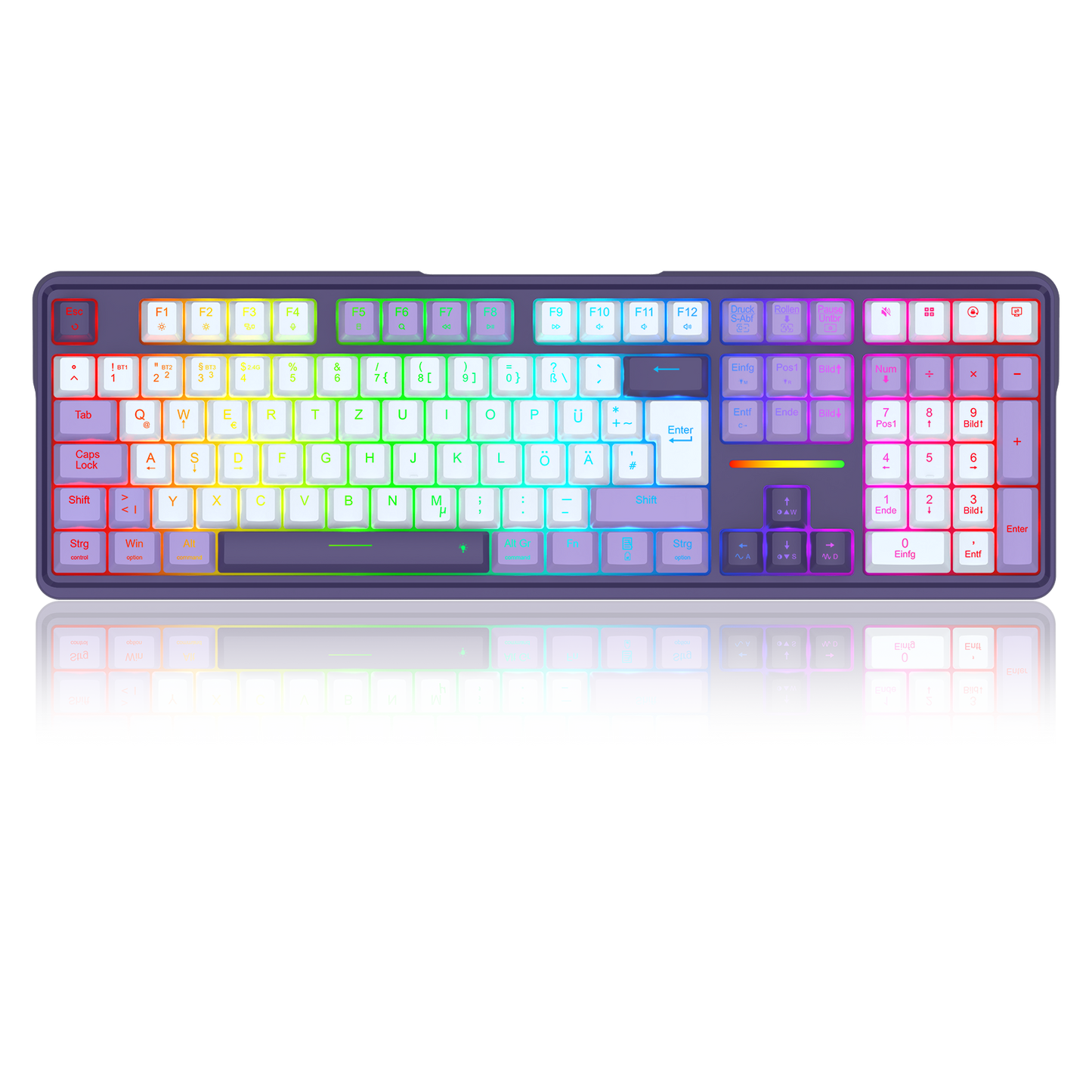 A full-sized mechanical keyboard with a dark frame and RGB backlighting that transitions through a rainbow spectrum of colors across the keys, shown on a reflective white surface.