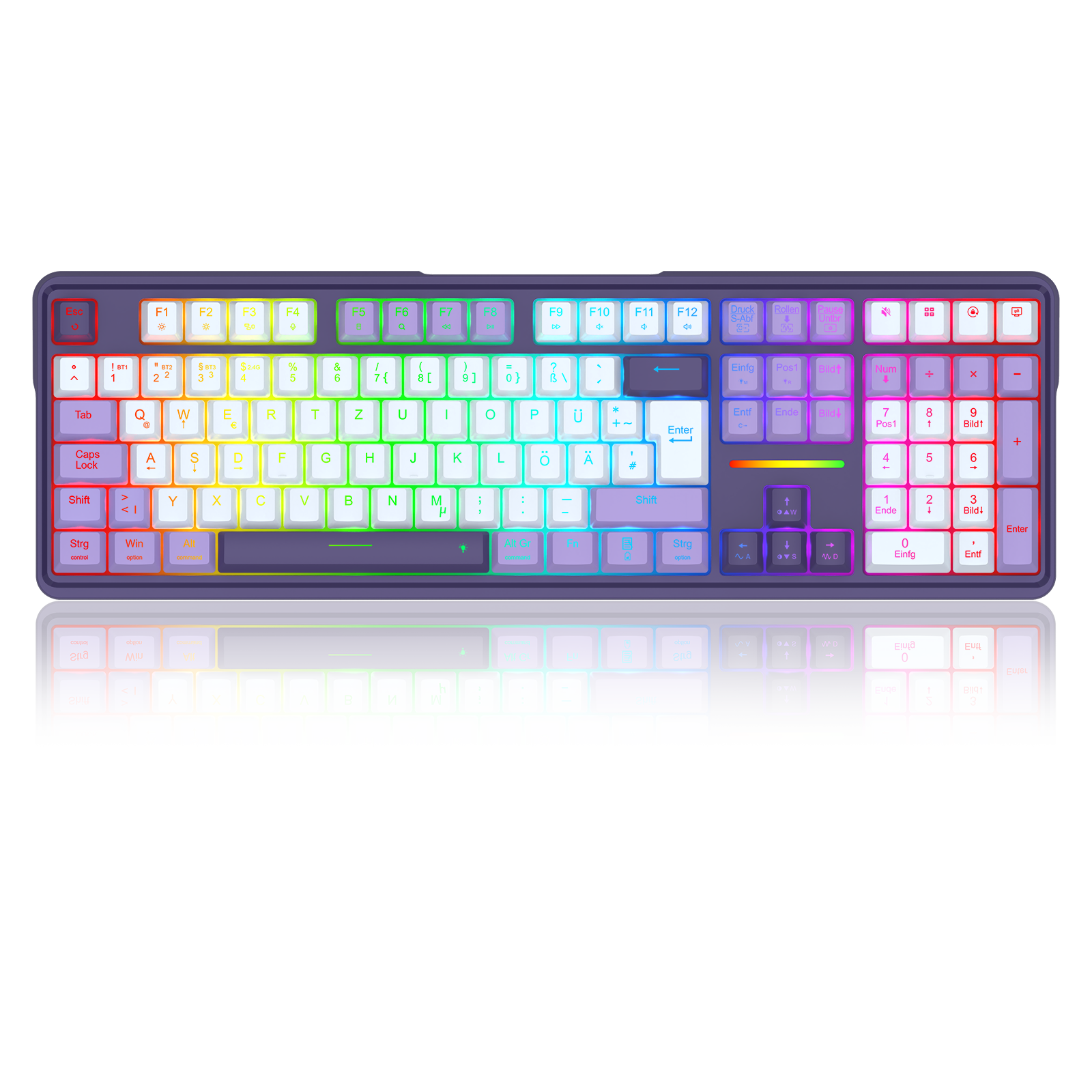 A full-sized mechanical keyboard with a dark frame and RGB backlighting that transitions through a rainbow spectrum of colors across the keys, shown on a reflective white surface.