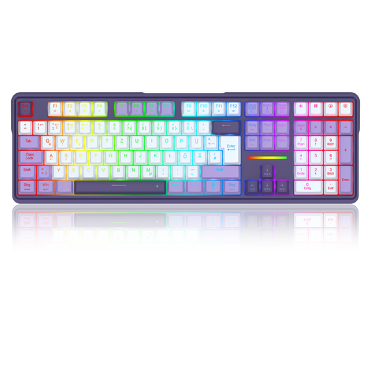 A full-sized mechanical keyboard with a dark frame and RGB backlighting that transitions through a rainbow spectrum of colors across the keys, shown on a reflective white surface.