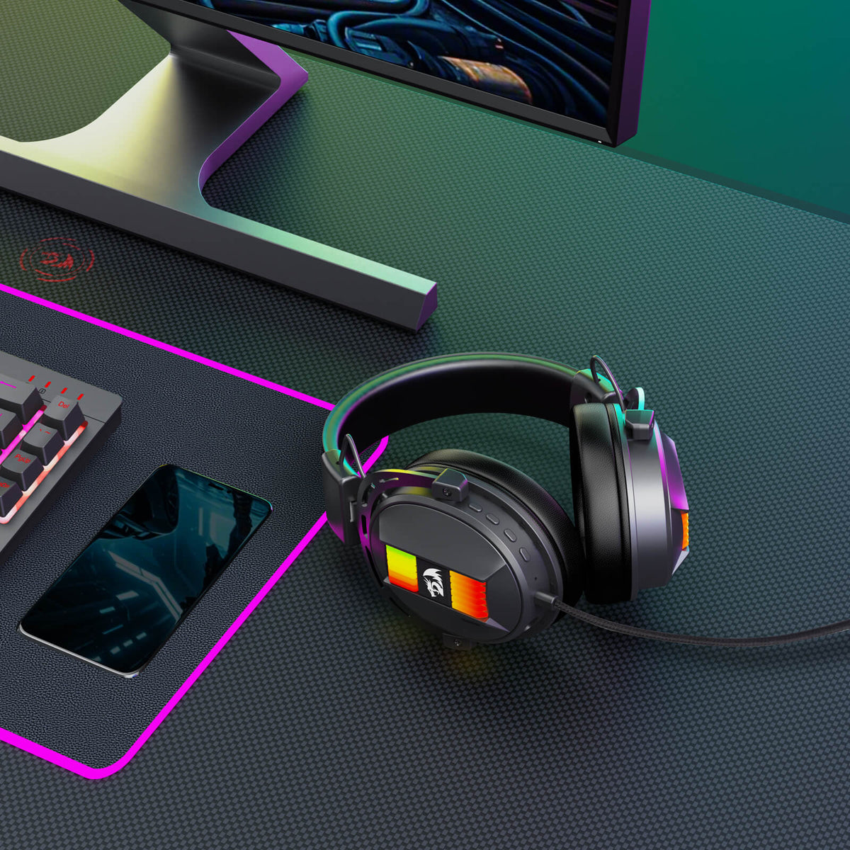 Redragon EU H375 Gaming headset on a desk with computer setup