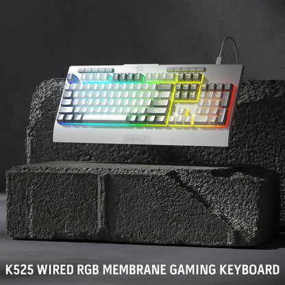 Redragon EU White K525 Wired RGB Membrane Gaming Keyboard on a dark stone surface with a dark background