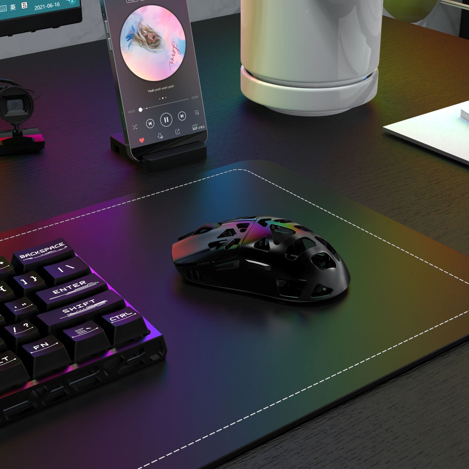 Gaming keyboard and mouse on a desk with smartphone and RGB light effects