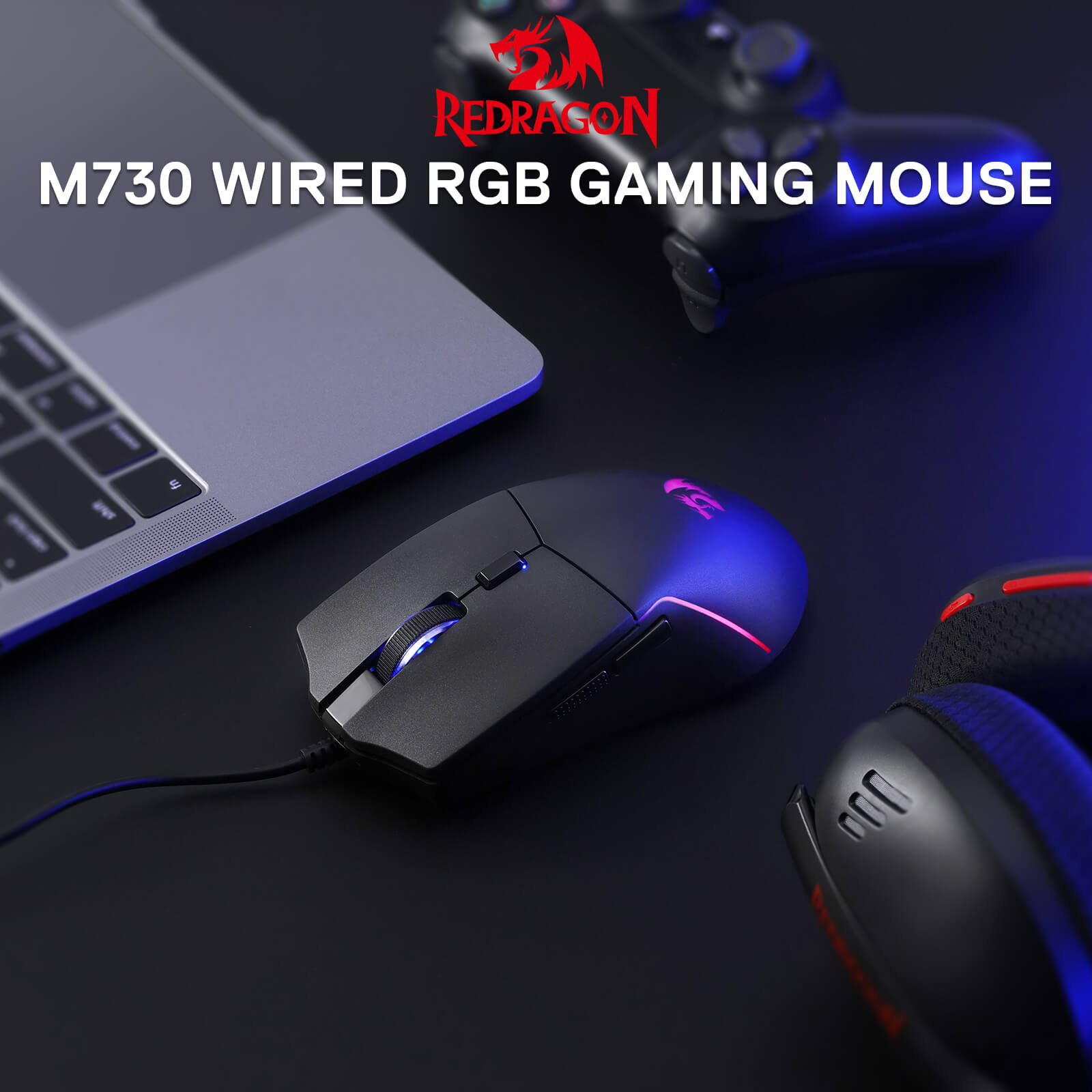 Redragon M730 wired RGB gaming mouse on a dark surface with laptop and keyboard in the background.